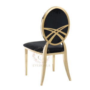Modern black and gold stainless steel event chair with an artistic abstract laser-cut backrest, luxury designer quality for banquet seating