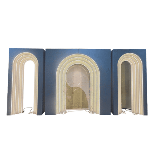 High-end architectural stone texture arch backdrop wall for quiet luxury wedding and corporate events