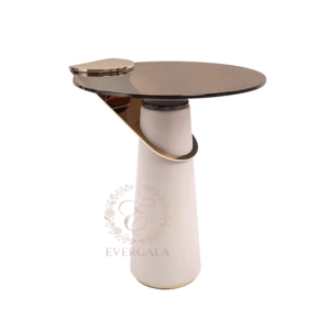 Wholesale circular cake table featuring a beige leather-clad wooden pedestal and tawn glass top.