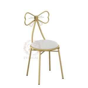 Charming gold stainless steel wedding chair featuring a romantic bow-tie laser-cut backrest, decorative seating for bridal showers