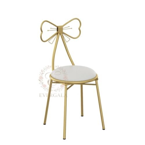 Charming gold stainless steel wedding chair featuring a romantic bow-tie laser-cut backrest, decorative seating for bridal showers
