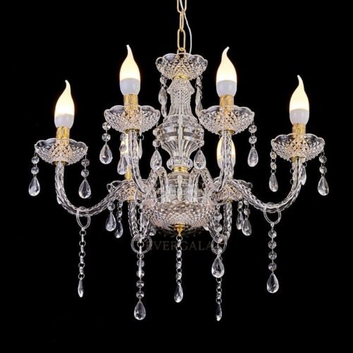 Classic vintage candle style crystal chandelier with elegant hanging droplets for traditional wedding venues