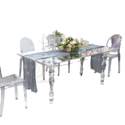 EverGala crystal clear acrylic rectangular dining table with elegant tapered legs and matching ghost chairs, perfectly styled for luxury wedding banquets and floral event decor.