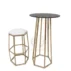 Contemporary cocktail table featuring a geometric hexagonal gold frame and a sleek black round top. Perfect for modern weddings, corporate events and upscale party venues.
