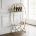 large arched gold wine rack display stand for wedding backdrop (1)
