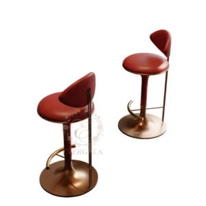 Opulent bar stool with plush red velvet upholstery and a shiny gold metal base. The bold design adds a touch of luxury to gala dinners, wedding receptions and high-profile events.