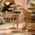mid-century green upholstered gold metal bar stool for wedding venues (1)