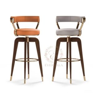 Stylish modern bar stool with olive green fabric upholstery, warm wooden legs and subtle gold accents. A versatile addition to wedding banquets, hotel bars and contemporary event spaces.