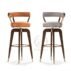 Stylish modern bar stool with olive green fabric upholstery, warm wooden legs and subtle gold accents. A versatile addition to wedding banquets, hotel bars and contemporary event spaces.