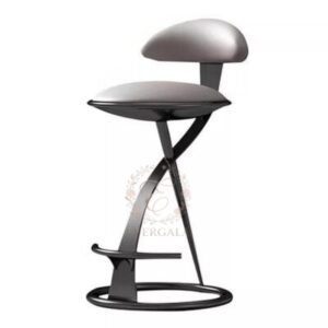 Contemporary industrial-style bar stool with a grey upholstered seat and a striking black metal cross base. Durable and stylish, ideal for modern event spaces, bars and cafes.