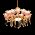 Bridgerton inspired Regency style gold crystal chandelier with romantic pink floral crystal accents